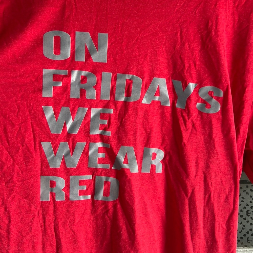 Unisex BNWOT Bella Canvas “On Fridays We Wear Red” shirt size Medium